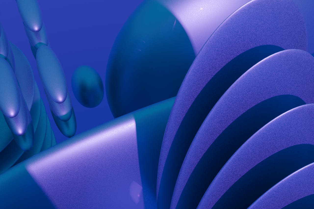 Vivid 3D abstract render showcasing blue curved shapes and patterns.